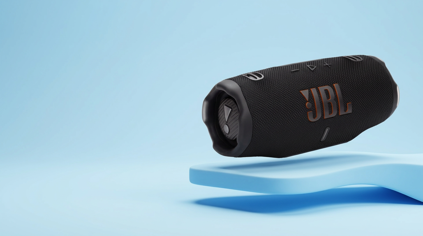 Black JBL Charge 6 speaker on a blue studio platform
